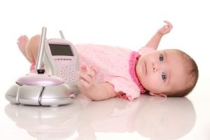 baby with baby monitor as a safety concept