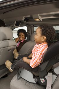 Boy Sitting in Car Seat